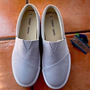 Never worn with tags TOMS Slip on shoes
